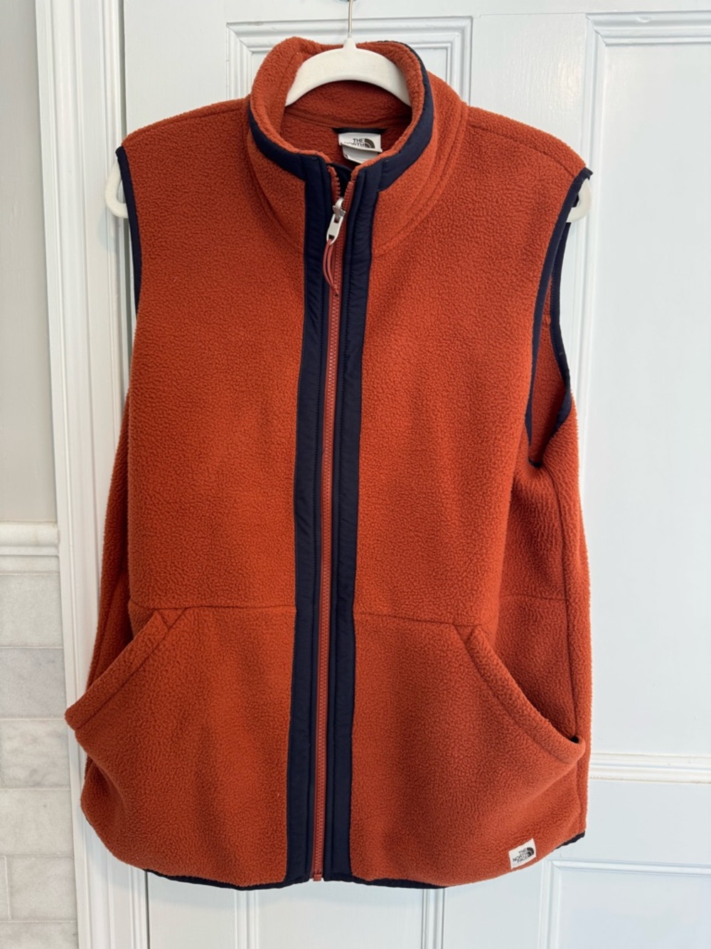 The North Face Burnt Orange Fleece Patch Beanie with Navy Edge